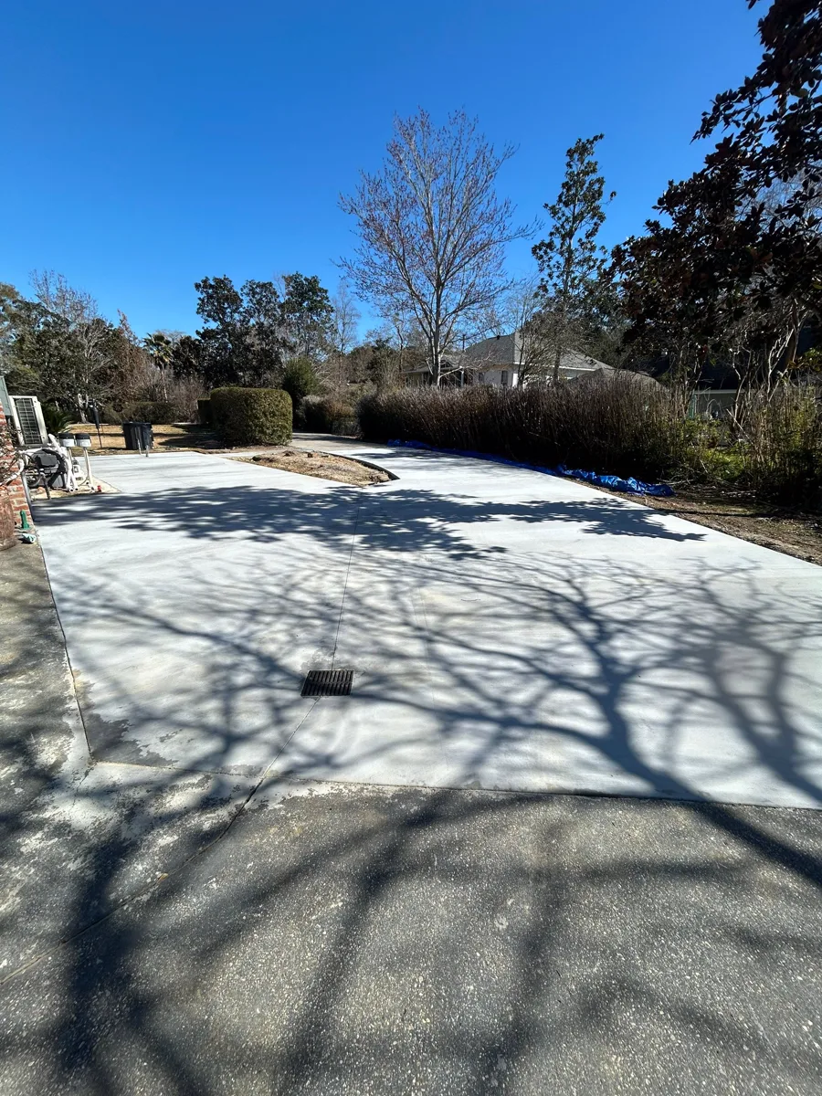 Freshly placed SCS carport slab in Madisonville